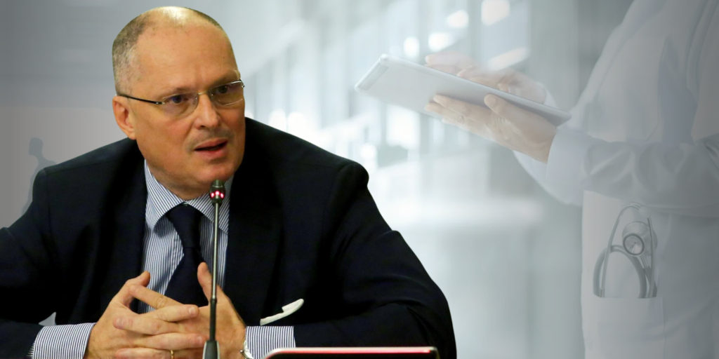 immagine con uno sfondo che ritrae ambiente sanitario e in primo piano la foto di Walter Ricciardi sul tema dell'investimento in sanità